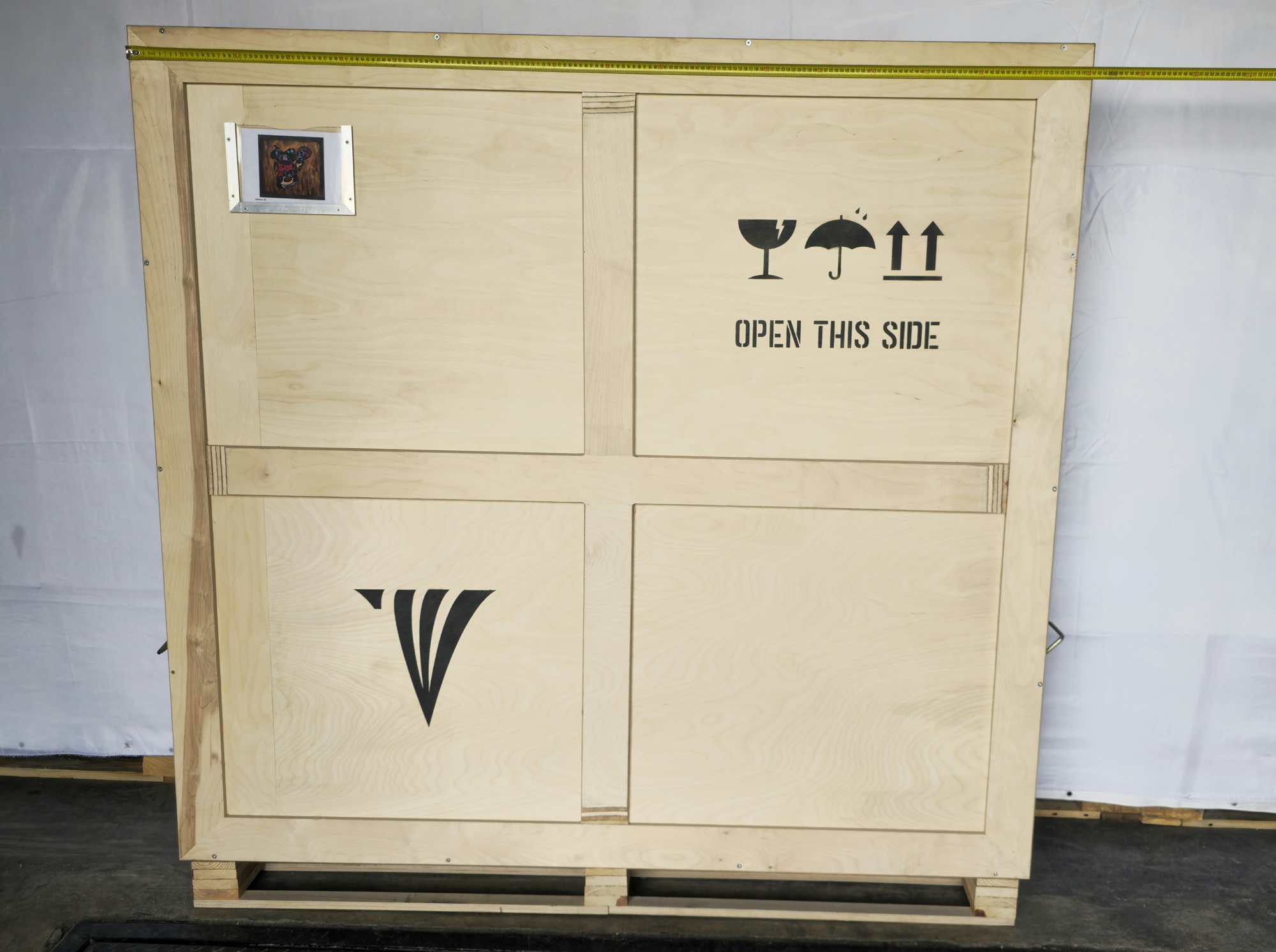 Crate width reference for Darius III , 2005 with tape measure
