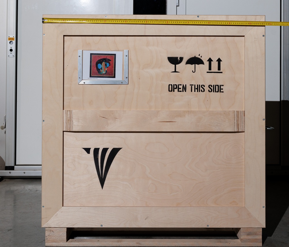 Crate width reference for The King of Democracy, 2018 with tape measure