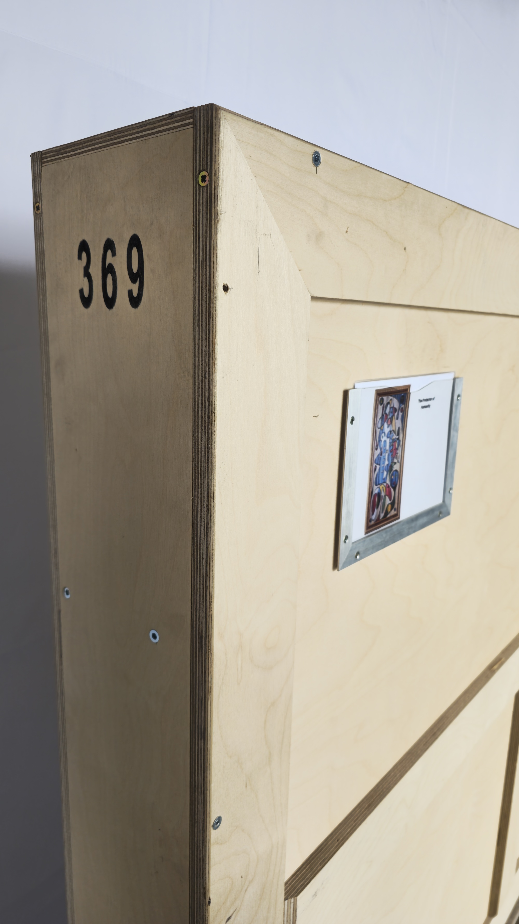 Identification markings on crate for The Protector of Humanity, 2017